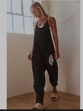 NWOT FREE PEOPLE Movement Hot Shot Logo Onesie in Washed Black
